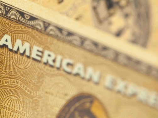 Munich, Germany - July 8th, 2011: Close up of an American Express Gold credit card. American express accounts for nearly a quarter of all credit card transactions in the US.